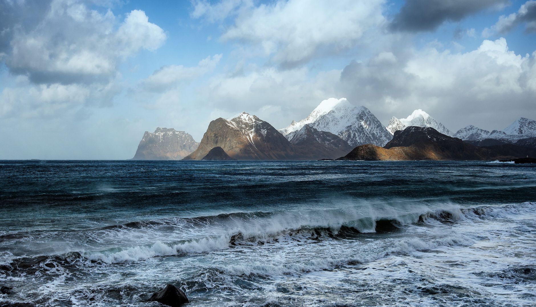 Dramatic view of Lofoten peaks rising out of the Norwegian Sea
